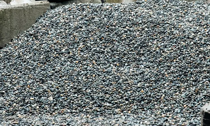 Round stone in a bin at the yard